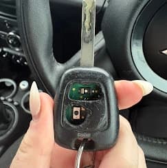 Car transponder key replacement programmed by Ashton Lock & Key in Wigan â€” chip visible in key head